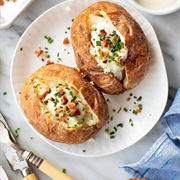 1 Baked Potato With Butter, Cheese, and Bacon Bits