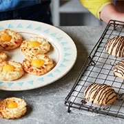 12 Coconut Macaroons, Six Piped With a Mango Curd, Six Drizzled and Filled With Chocolate