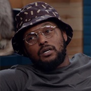 3. Schoolboy Q Wears a Patterned Bucket Hat & Glasses
