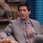 27. Ken Marino Wears a Slim Gray Suit and Salmon Tie