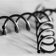 Ernest Godward Invents the Spiral Hairpin.