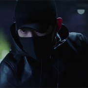 Suspicious Man With Black Cap and Mask