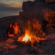 Hang Out With Friends Around a Campfire