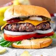 Grass Fed Hamburger With Mayo, Mustard, Ketchup, Cheese, and Homegrown Tomato