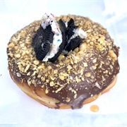 Tory's Donuts & Pastries Chocolate Almond Coconut Oreo Donut