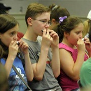 Bring a Box of Harmonicas to a Daycare