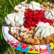 Funnel Cake With Strawberries and Powdered Sugar