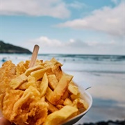 Eaten Fish and Chips on a Beach