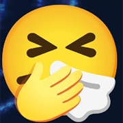 Sneezing Face With Tightly Closed Eyes Covering His Mouth Wiping His Nose With a Tissue