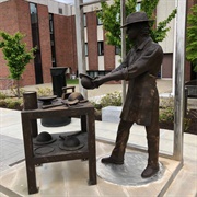 Hat Maker Statue