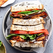 Provolone, Havarti, Roasted Red Pepper, Pickled Eggplant, Romaine, Tomato, and Onion Sandwich