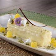 Coconut Bar With Pineapple-Basil Compote and Vanilla Cream