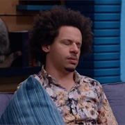 19. Eric Andre Wears a Cat Collage Shirt & Sneakers