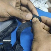 Rolled Up the Straps on Backpack