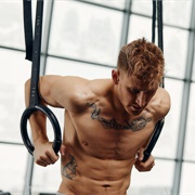 Do 5 Muscle Ups on the Rings
