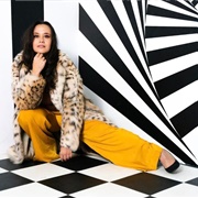 Kelly Lynne D'Angelo (Bisexual/Queer, She/They)