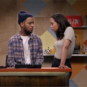 31. Uzo Aduba Wears a White Blouse and Royal Blue Heels