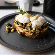 Poached Eggs With Mushroom, Pesto, Mozzarella and Toasted Almonds