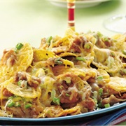 Nachos With Refried Beans, Cheese and Guacamole