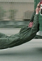 Jackie Chan as "Kevin" Chan Ka-Kui in "Police Story" (1985)