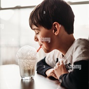 Blowing Bubbles in a Glass