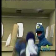 Grover Bouncing on the Blue Guy on the Plane