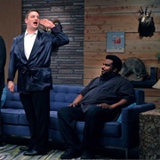 2. Craig Robinson Wears a Bordeaux Button Down & Dark Jeans