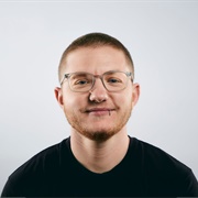 KRYS MALCOLM BELC (Non-Binary, He/Him)