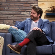 1. Zach Galifianakis Wears a Blue Jacket & Red Socks