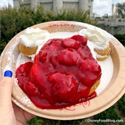 Mickey-Shaped Waffle With Strawberries and Powdered Sugar