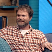 11. Rainn Wilson Wears a Short Sleeved Plaid Shirt & Colorful Sneakers