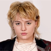 Kizzy Edgell (Queer, Trans-Masculine, He/They)