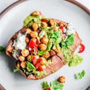 Sweet Potato With Tomato, Avocado, Roasted Chickpeas, Coriander, Paprika and Coconut Yoghurt