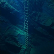 A Ladder in a Flooded Quarry