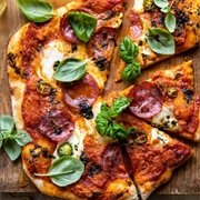 Basil, Olive, and Onion Naan Pizza