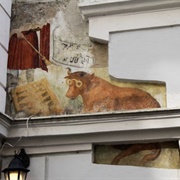 Wolf and Cow Playing Backgammon Mural