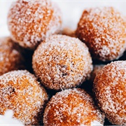 Glazed Round Donut With Vanilla Drizzle and Coconut