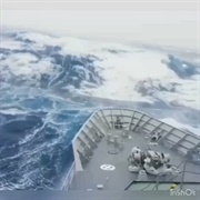 Ship Battling the Waves