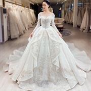 Wedding Gown Skirt "Peeled Back" to Reveal Underlayer