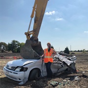 Drive an Excavator/ Crush a Car