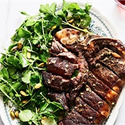 Bistecca Alla Fiorentina With Watercress and Pistachio Salad