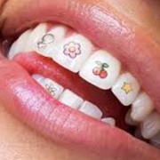 Hismile Tooth Tattoo