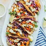 Sheet Pan Crispy Tempeh and Broccoli Tacos With Shredded Cabbage and Mashed Avocado