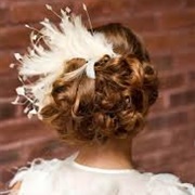 Feathers in Hair With Wedding Dress