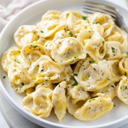 Pesto and Goat Cheese Tortelloni in Garlic Parmesan Sauce