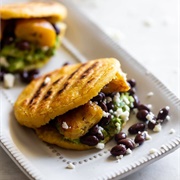 Black Bean, Avocado, Cheese, and Plantain Arepa