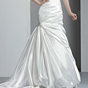 Jeweled Brooch at Side Gather of Skirt