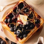 Waffle With Dark Blue Berry Syrup