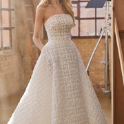 Textured Fabric of Embroidered Layers