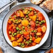 Tomato, Cabbage, Pea, and Sweet Potato Stew